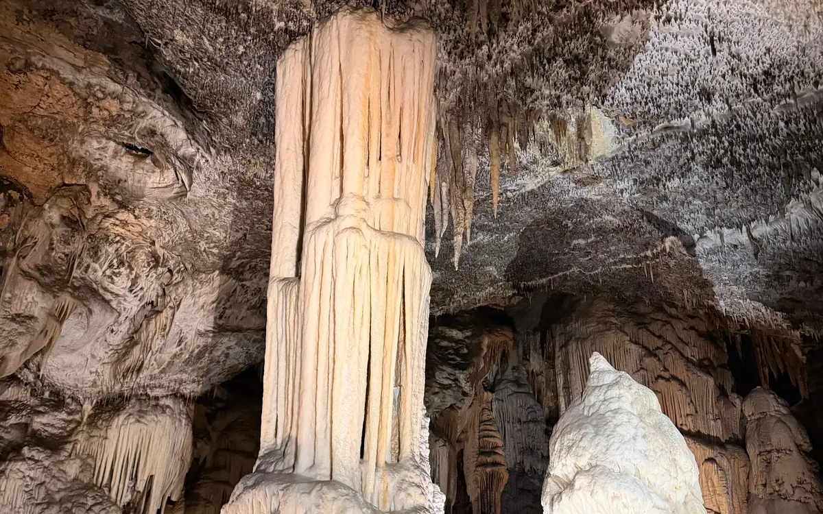 Predjama Castle built into the mouth of a cave in a vertical cliff face near Postojna