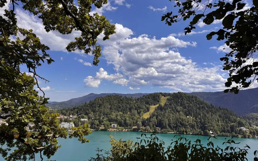 Lake Bled and the surrounding hills from the shore path